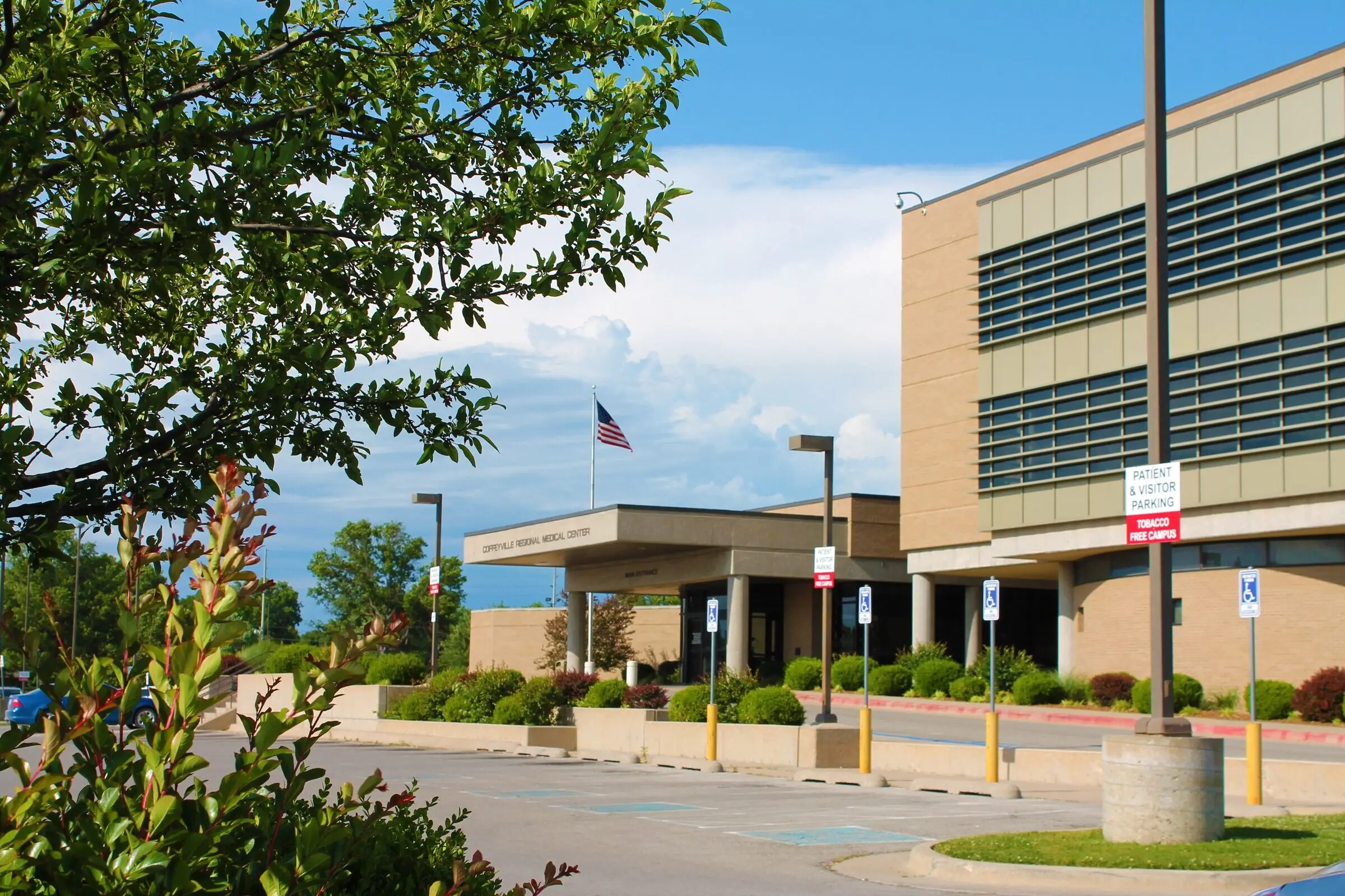 The west entrance of Coffeyville Regional Medical Center on a sunny day